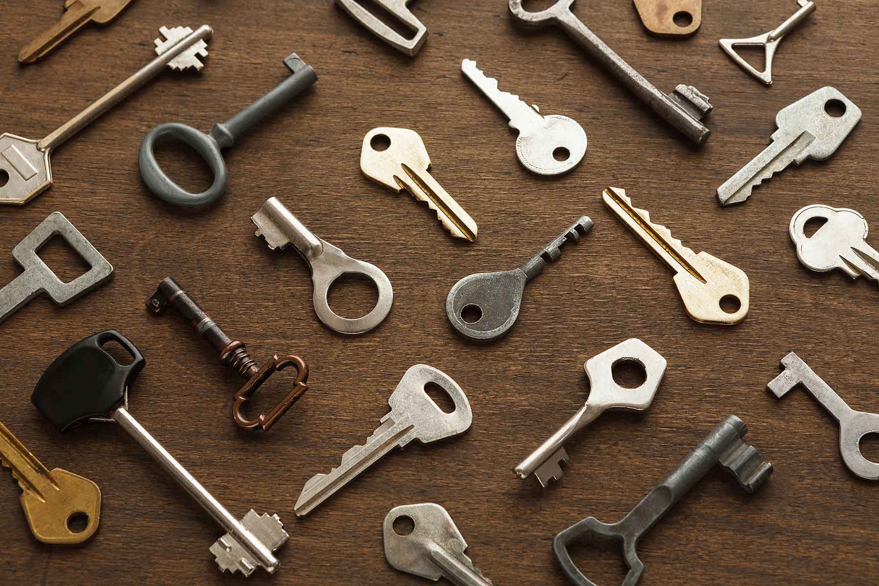 many-different-keys-on-wood-PTJ5KRK.jpg